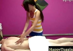 Asian masseur getting her client horny