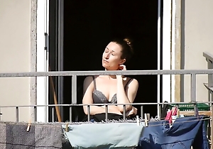 This nice matriarch receives some sun nearly brassiere during the lockdown