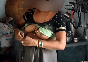 Indian aunty displays papaya output sized beautiful boobs