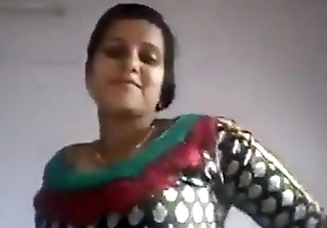 Young Indian housewife showing chubby pair