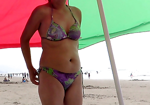 Latin babe mom shows lacking on the beach increased by masturbates deliciousl